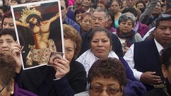 Believers congregate to pay homage to the "Lord of the Miracles" in Lima